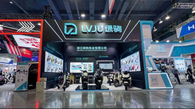 Display of modern electric scooters showcased by LVJU at the 139th Canton Fair, highlighting smart mobility solutions and innovative design for urban transportation.