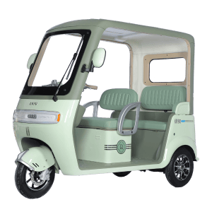 Modern electric rickshaw designed for eco-friendly urban transportation, featuring a compact build, comfortable seating, and efficient battery-powered motor.